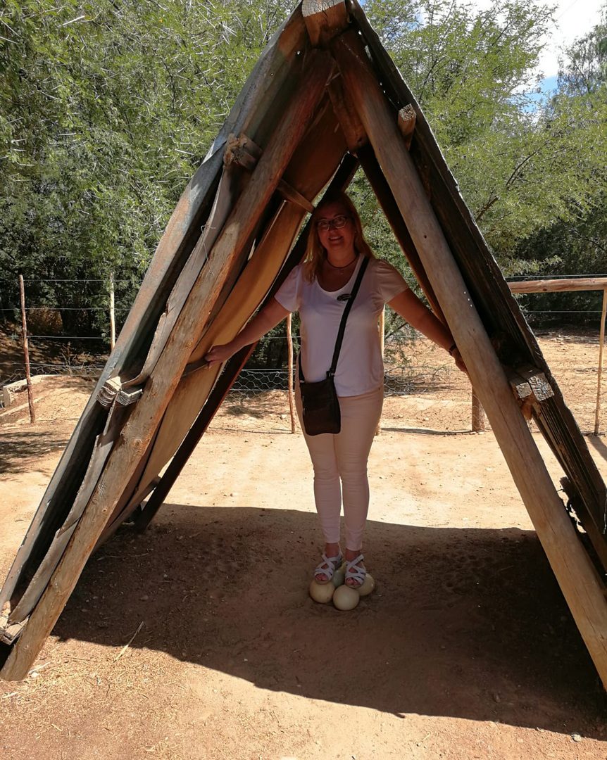Elena standing on ostrich eggs