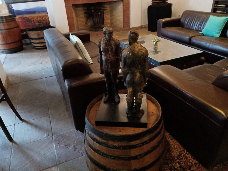 A picture of a sitting room in a wine cellar
